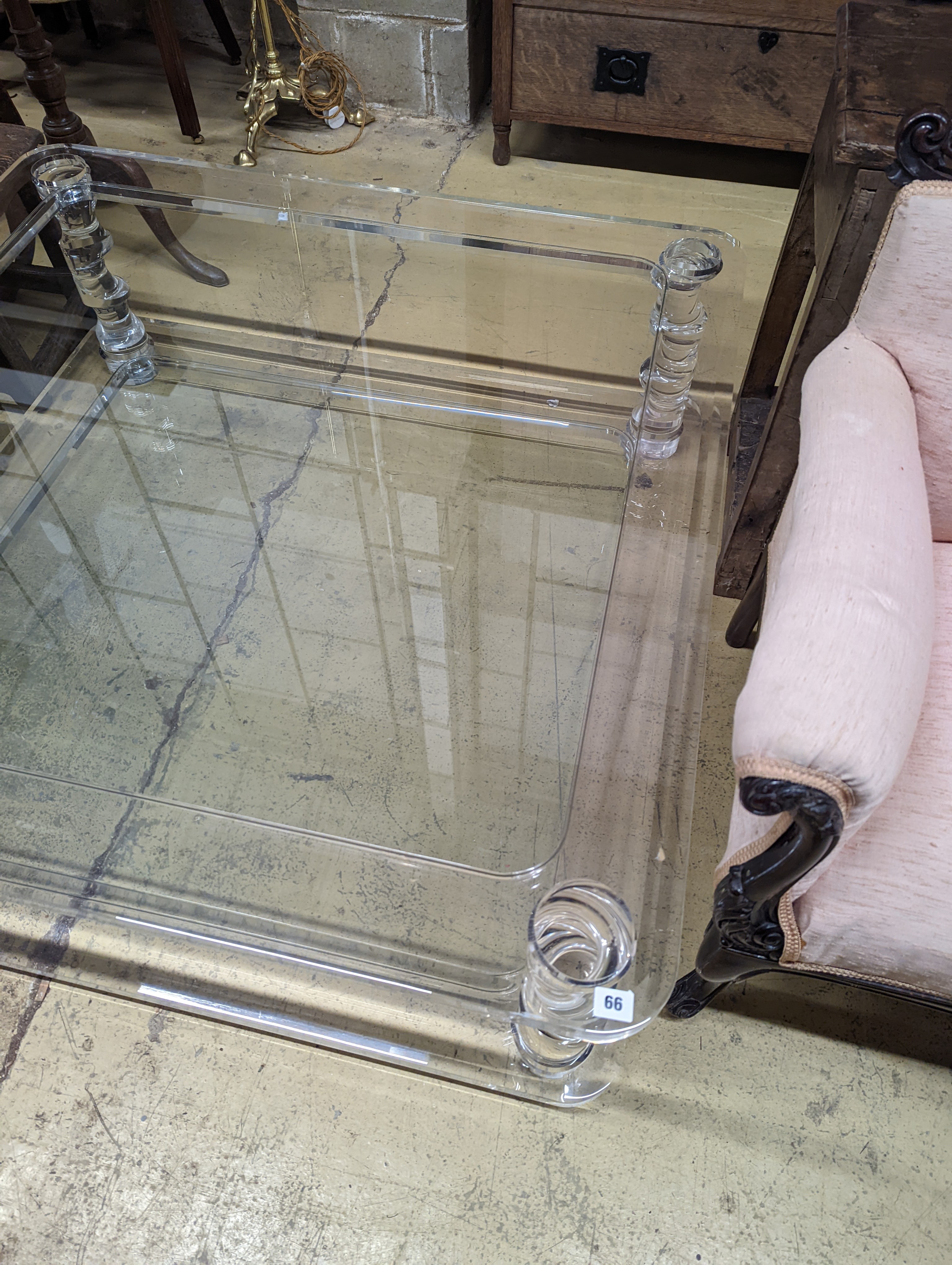 A contemporary perspex and glass square two tier coffee table, width 120cm, height 40cm